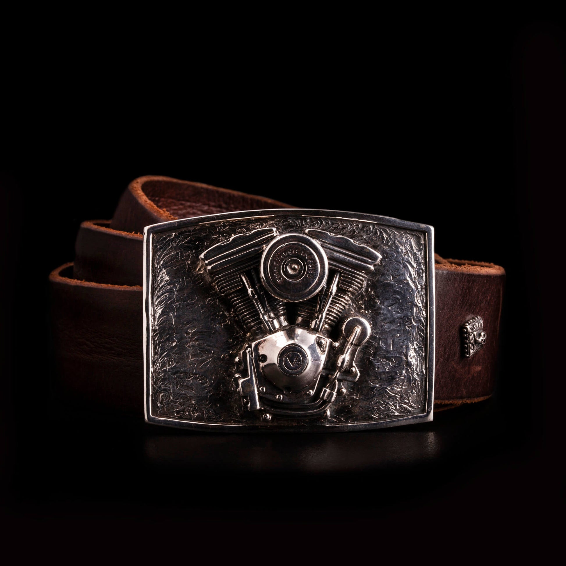 Fibbia in argento925 del motore 1340 Harley Davidson completa di cintura in cuoio.