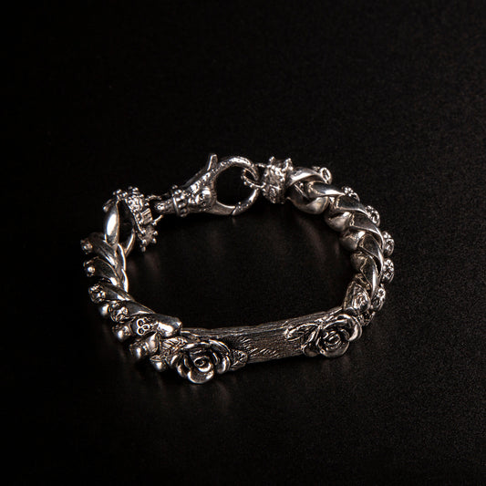Bracciale in argento925 con maglia a grumetta e piastrina centrale con due rose alle estremita' personalizzabile. 